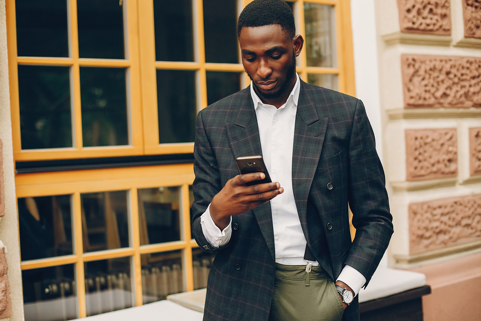 Young Businessman Using His Smartphone 